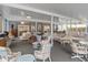 Bright and airy sunroom with various seating options perfect for relaxation or entertaining guests at 15053 Peace Blvd, Spring Hill, FL 34610