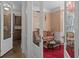 Cozy living room with French doors, decorative rug, and comfortable seating at 15053 Peace Blvd, Spring Hill, FL 34610
