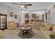 Spacious living room with large columns that open to the kitchen at 15053 Peace Blvd, Spring Hill, FL 34610