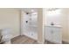 Newly renovated bathroom with a modern vanity, walk-in shower, updated fixtures, and modern toilet at 1540 7Th E Ave, Bradenton, FL 34208