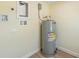 A new modern water heater in the laundry area at 1540 7Th E Ave, Bradenton, FL 34208
