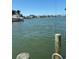Waterfront view with docks and boats at 19 N Pine Cir, Belleair, FL 33756