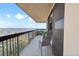Private balcony with seating and panoramic water views at 2413 Bayshore Blvd # 801, Tampa, FL 33629