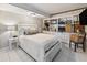 Cozy bedroom featuring a queen-size bed, white furniture and built-in shelves with decor at 2413 Bayshore Blvd # 801, Tampa, FL 33629