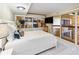 This bedroom features a queen-size bed and a sliding glass door to access the balcony at 2413 Bayshore Blvd # 801, Tampa, FL 33629