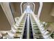 Interior shot of a high-rise building featuring multiple balconies, elevators, and foliage at 2413 Bayshore Blvd # 801, Tampa, FL 33629