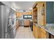 Well-equipped kitchen with stainless steel appliances and granite countertops at 2413 Bayshore Blvd # 801, Tampa, FL 33629
