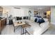 Living room showcasing a comfortable sectional sofa, two tables, and stylish decor at 2413 Bayshore Blvd # 801, Tampa, FL 33629
