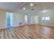 Open living area showcasing wood floors, recessed lighting, and neutral walls at 2557 Laurelwood Dr # 10E, Clearwater, FL 33763