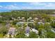 Panoramic aerial view of the home nestled in a lush landscape with waterfront views at 322 Ontario Ave, Crystal Beach, FL 34681