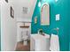 Charming bathroom with modern fixtures, vanity, and a beach-themed decor at 322 Ontario Ave, Crystal Beach, FL 34681
