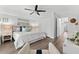 This primary bedroom is well-lit with an ample closet and calming wall art at 322 Ontario Ave, Crystal Beach, FL 34681