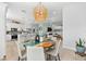 Open dining area connected to the kitchen, perfect for entertaining guests at 322 Ontario Ave, Crystal Beach, FL 34681
