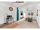 Bright living room with sleek furniture, a modern desk, and artful decor at 322 Ontario Ave, Crystal Beach, FL 34681