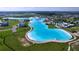 An aerial view shows the lagoon and its surrounding area in the Epperson Lagoon community in Wesley Chapel, Florida at 32573 Turtle Grace Loop, Wesley Chapel, FL 33545