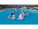 A community pool offers water structures for summer fun at the Epperson Lagoon in Wesley Chapel, Florida at 32573 Turtle Grace Loop, Wesley Chapel, FL 33545