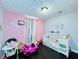 Whimsical bedroom decorated with custom lettering, soft colors and playful decor at 3498 13Th S Ave, St Petersburg, FL 33711