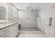 Modern bathroom with a glass-enclosed shower, elegant tile work, and a sleek vanity at 409 Regent N Ln, St Petersburg, FL 33701