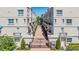 Elegant townhomes feature brick paved entryway and manicured landscaping within a gated community at 409 Regent N Ln, St Petersburg, FL 33701