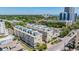 Modern condo building boasting rooftop patios, lush landscaping, and sidewalks in a vibrant city location at 409 Regent N Ln, St Petersburg, FL 33701