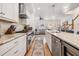Spacious kitchen with modern appliances, marble countertops, and an open floor plan at 409 Regent N Ln, St Petersburg, FL 33701
