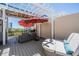 Relax on this rooftop deck with an outdoor seating area, shade, and skyline views at 409 Regent N Ln, St Petersburg, FL 33701