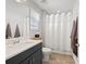 Bathroom featuring modern vanity, lighting, and tiled floors at 4108 Mellon Dr, Odessa, FL 33556