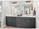 Bathroom featuring modern vanity, lighting, and tiled floors at 4108 Mellon Dr, Odessa, FL 33556