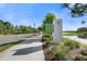 Albritton Park entrance sign near a sidewalk, street, and lakeside at 4108 Mellon Dr, Odessa, FL 33556