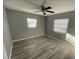 Bright bedroom with tile floors and two large windows at 4301 15Th N Ave, St Petersburg, FL 33713