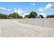 Spacious backyard featuring stone tiles and white gravel offering a modern and low-maintenance design at 4675 26Th N Ave, St Petersburg, FL 33713
