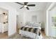 Comfortable bedroom with ceiling fan and an ensuite bathroom at 4675 26Th N Ave, St Petersburg, FL 33713