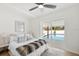 Comfortable bedroom with ceiling fan and a view of the swimming pool at 4675 26Th N Ave, St Petersburg, FL 33713