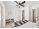 Comfortable bedroom with ceiling fan and walk-in closet at 4675 26Th N Ave, St Petersburg, FL 33713