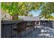 Outdoor deck featuring built-in bar and seating, perfect for entertaining or enjoying the outdoors at 506 Spring Tree Ct, Tarpon Springs, FL 34689