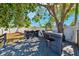 This outdoor deck is ideal for entertainment or relaxing under the shade of a large tree at 506 Spring Tree Ct, Tarpon Springs, FL 34689