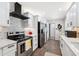 Well-equipped kitchen featuring stainless steel appliances, sleek countertops, and ample storage space at 506 Spring Tree Ct, Tarpon Springs, FL 34689