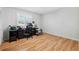 Office with light wood floors and natural light at 506 Spring Tree Ct, Tarpon Springs, FL 34689