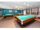 Spacious billiard room with multiple pool tables, perfect for friendly competition at 5915 18Th N St # 11, St Petersburg, FL 33714