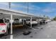 Covered parking area providing shade and protection for multiple vehicles at 5915 18Th N St # 11, St Petersburg, FL 33714
