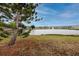 Picturesque pond view with a fountain and well-maintained landscaping at 5915 18Th N St # 11, St Petersburg, FL 33714