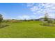 The expansive, well-maintained backyard overlooks the beautiful greenery of the area at 5958 Talon Preserve Dr, Nokomis, FL 34275