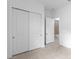 A light-filled bedroom features access to a sliding closet and a bathroom at 5958 Talon Preserve Dr, Nokomis, FL 34275