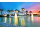 Talon Preserve entrance with lit fountain and Palm Trees at sunset at 5958 Talon Preserve Dr, Nokomis, FL 34275
