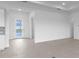 Clean entryway featuring recessed lighting, light tile floors, and a glass front door at 5958 Talon Preserve Dr, Nokomis, FL 34275