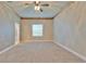 Bright bedroom with a window and neutral carpet flooring at 607 Vintage Way, Brandon, FL 33511