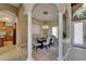 Dining room with chandelier lighting, archways, and tile flooring at 607 Vintage Way, Brandon, FL 33511