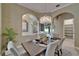 Dining room with chandelier lighting and archways at 607 Vintage Way, Brandon, FL 33511