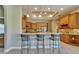 This kitchen features granite countertops, stainless steel appliances, and custom wood cabinets at 607 Vintage Way, Brandon, FL 33511