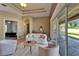 Living room featuring lots of light, modern furniture and door to the backyard at 607 Vintage Way, Brandon, FL 33511